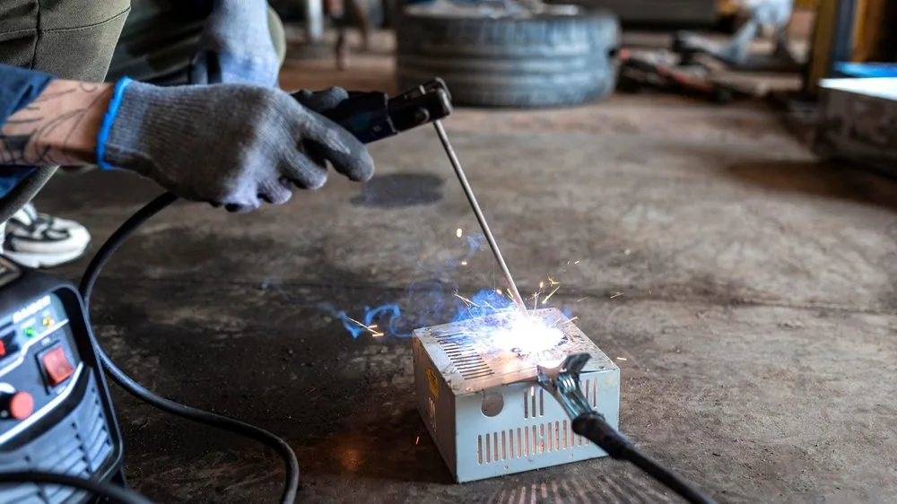 Precision welding on a workshop bench